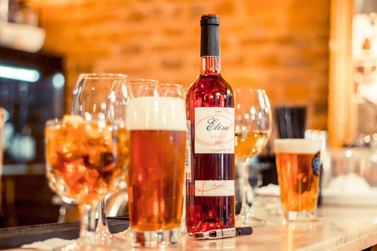 cozy bar atmosphere with wine and beer on marble counter showing different alcoholic beverages and joint health effects