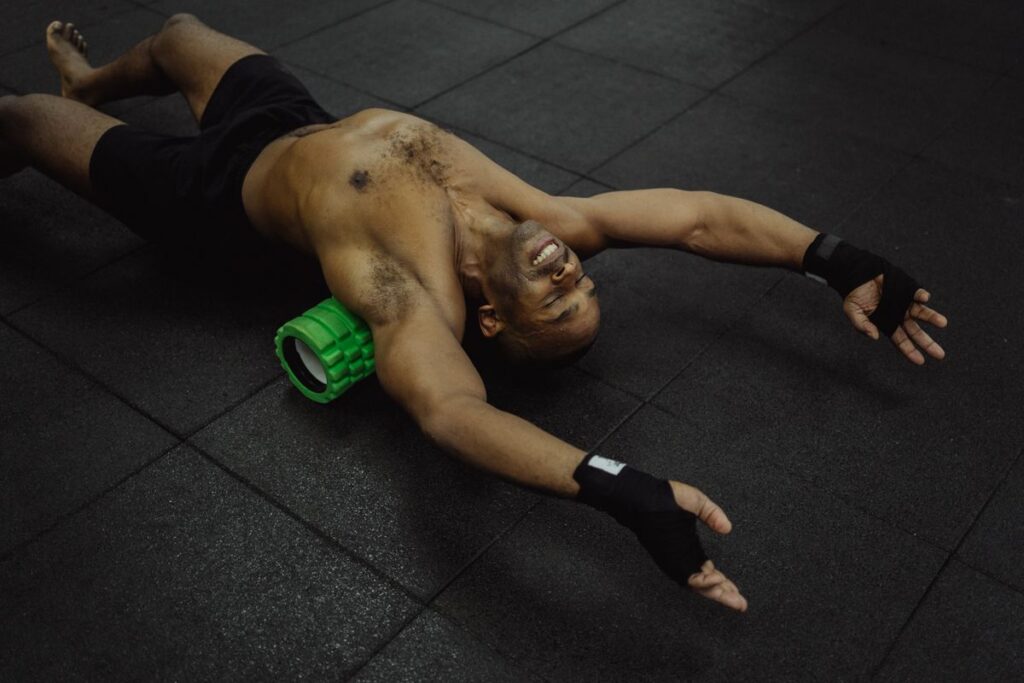 man using foam roller for muscle recovery after exercise
