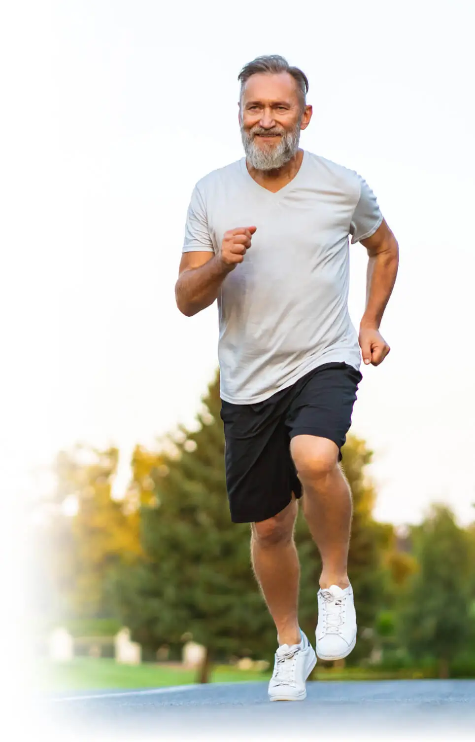 Active adult over 40 running outdoors after using topical arthritis pain relief cream for joint mobility