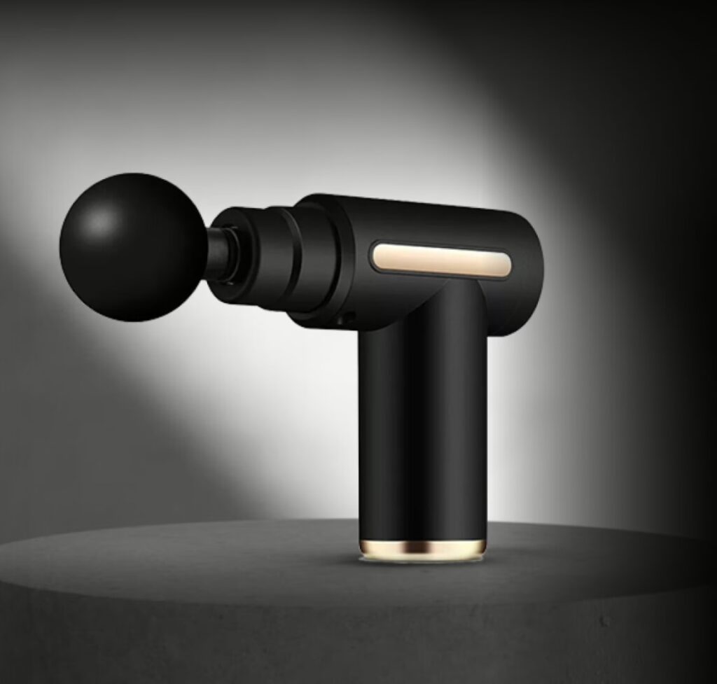 TheraOne Pro portable deep tissue percussion massage gun in matte black with gold trim detail for muscle recovery