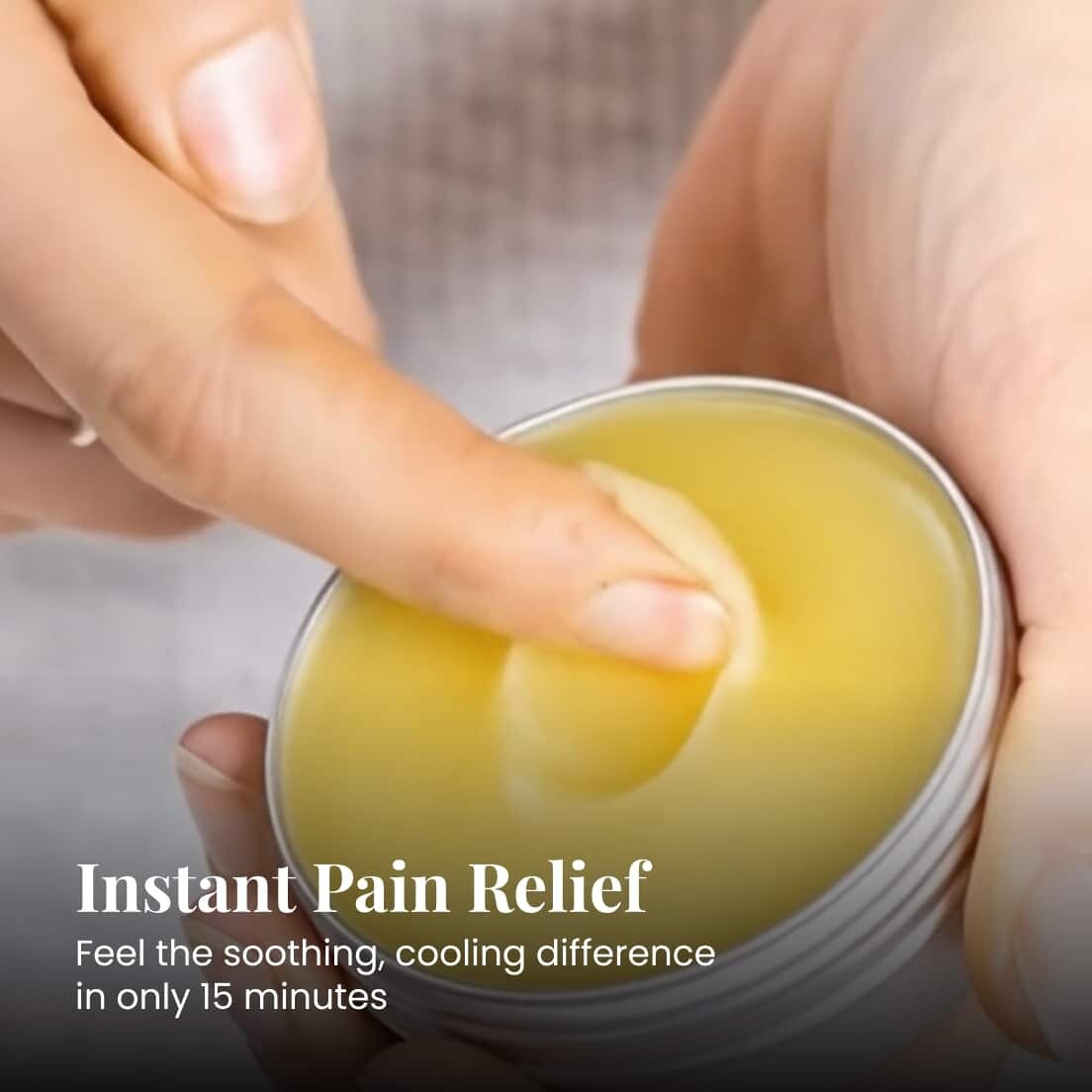 Hand applying TheraWolf Pain Relief Balm to joint area demonstrating proper application technique for joint and muscle pain relief