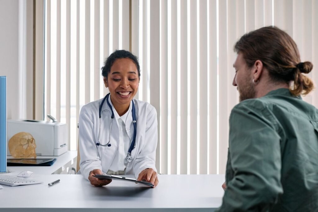 Doctor discussing a cortisone shot for joint pain with a patient during a medical consultation