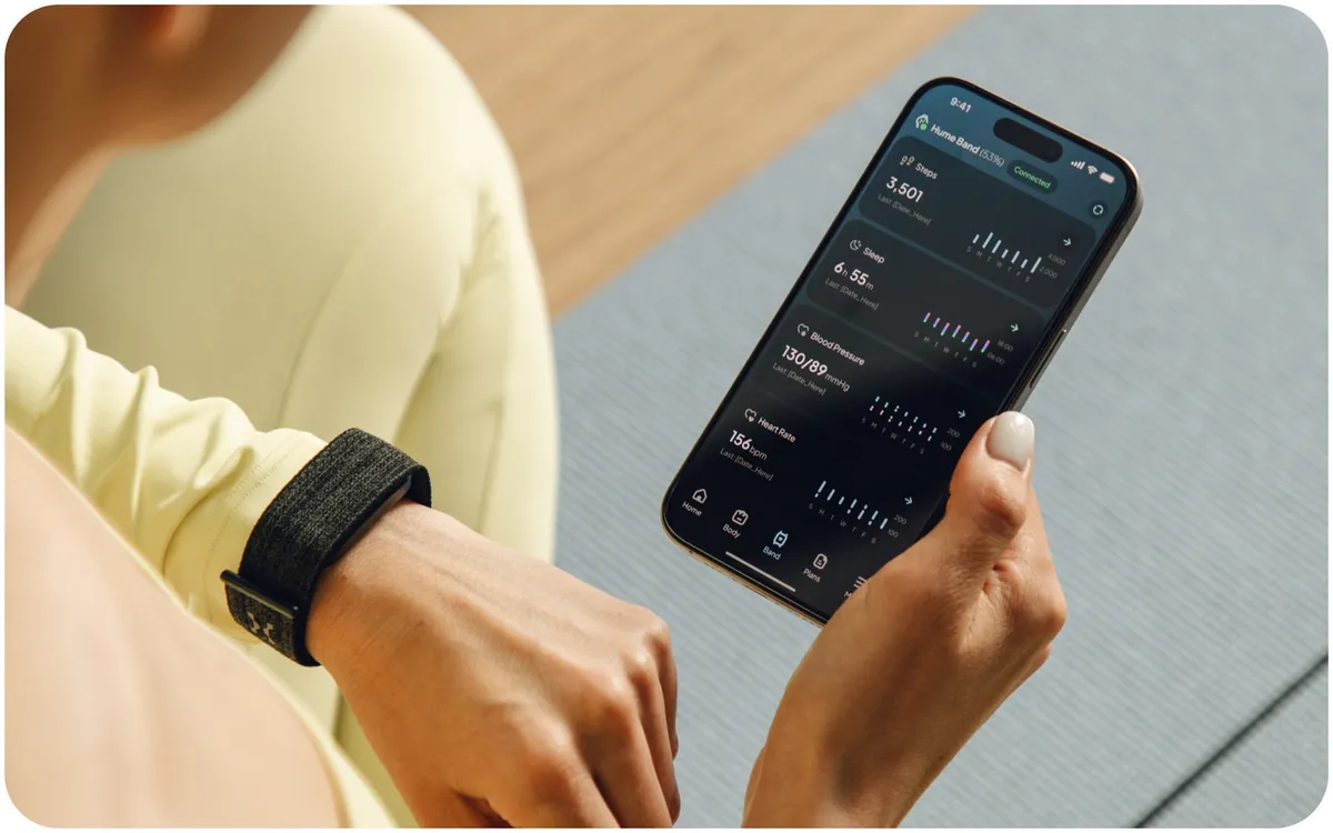 Hume Band 2.0 on the wrist next to the Hume Health app showing daily activity data