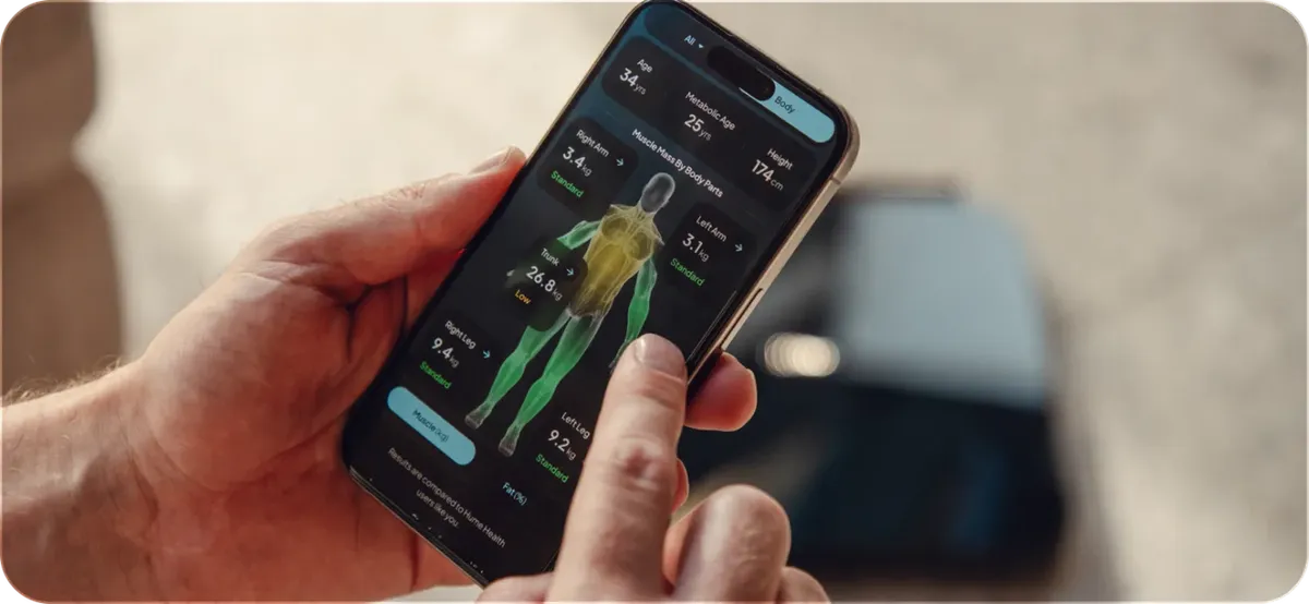 Hume Health app on a phone showing the segmental body map from a Hume Pod scan