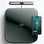 Hume Pod body composition scale with its hand-grip handle and the Hume Health app
