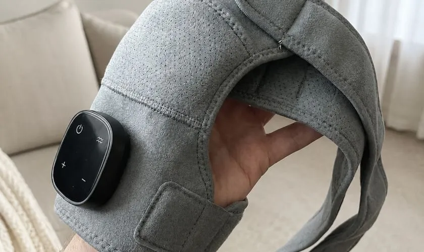 Close-up of the Kinessana heated shoulder wrap and controller